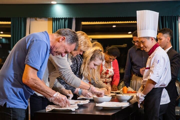 Delicious international buffet with diverse dishes and attentive staff at ViettrendTour.