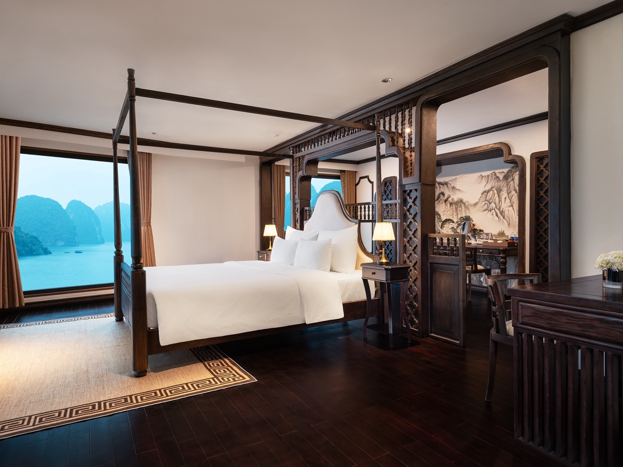 Panoramic Lan Ha Bay views from a luxury cruise cabin, perfect for a relaxing and scenic getaway wit.