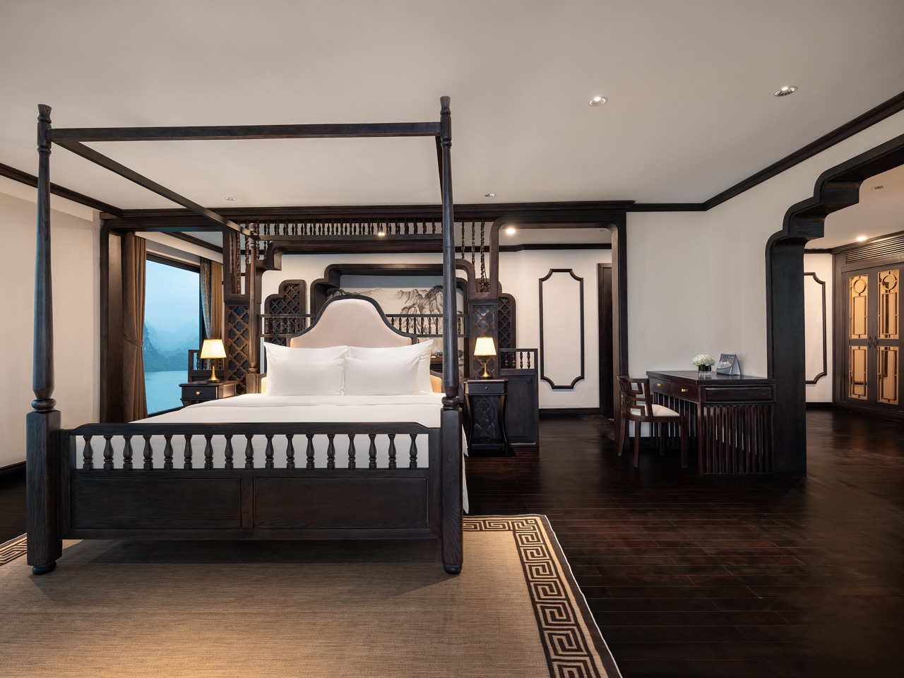 Elegant cruise bedroom with panoramic views of Lan Ha Bay, perfect for a romantic getaway.