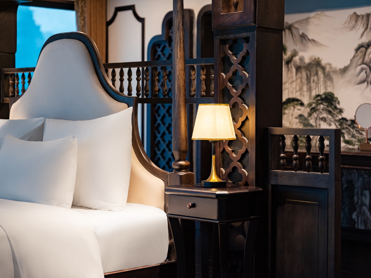 Elegant cruise balcony view of Halong Bay with serene waters and limestone karsts, perfect for a rom.