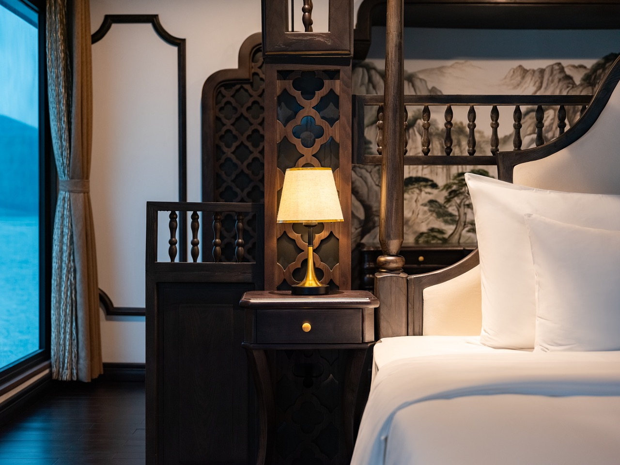 Luxurious cruise cabin with elegant wooden decor and comfortable bedding on Venus Cruise in Lan Ha B.