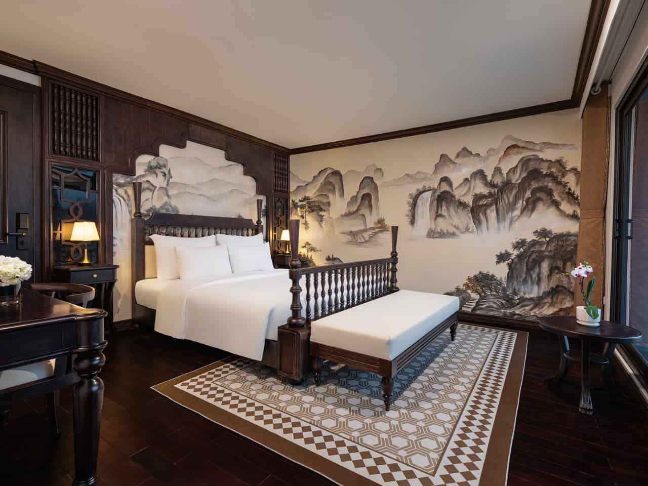 Lan Ha Bay cruise balcony with elegant decor and scenic mountain views.