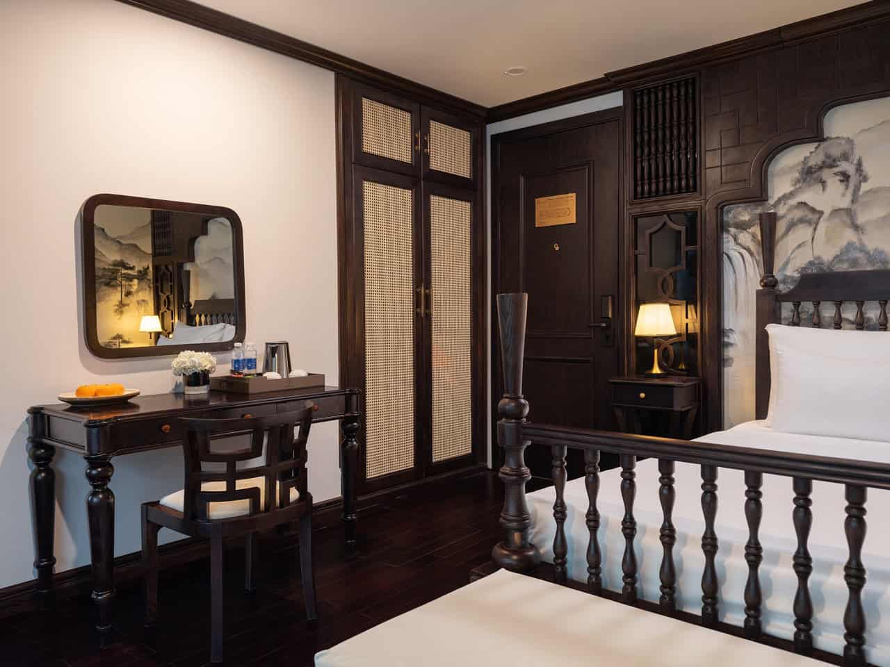 Elegant cruise balcony view of Lan Ha Bay with serene waters and lush islands, perfect for a relaxin.