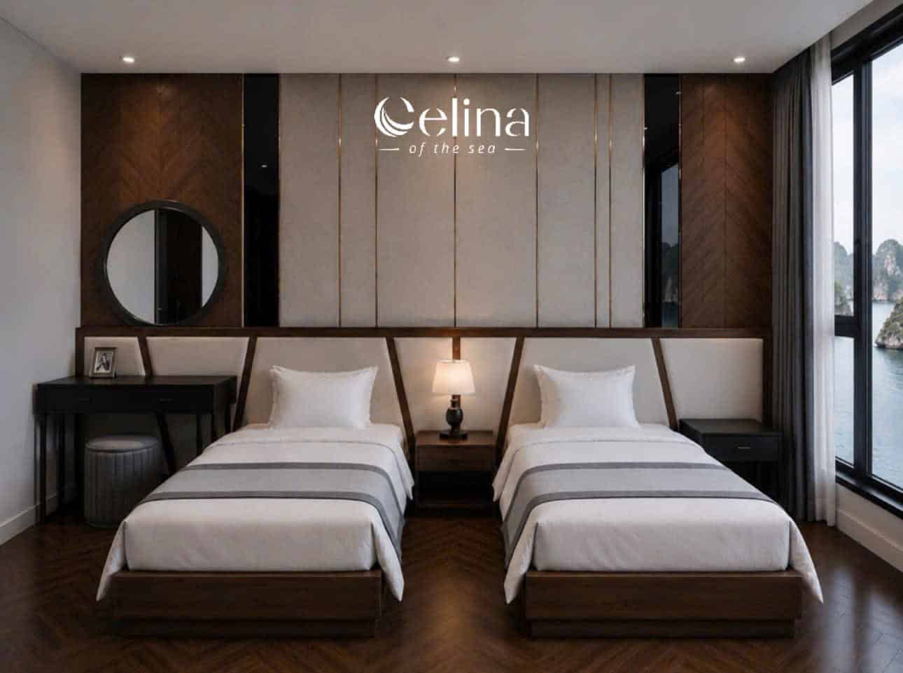 Twin-bed hotel room with a shared wooden headboard, central nightstand lamp, round mirror, and a large window showing water outside; wall displays 'Celina of the sea' logo.