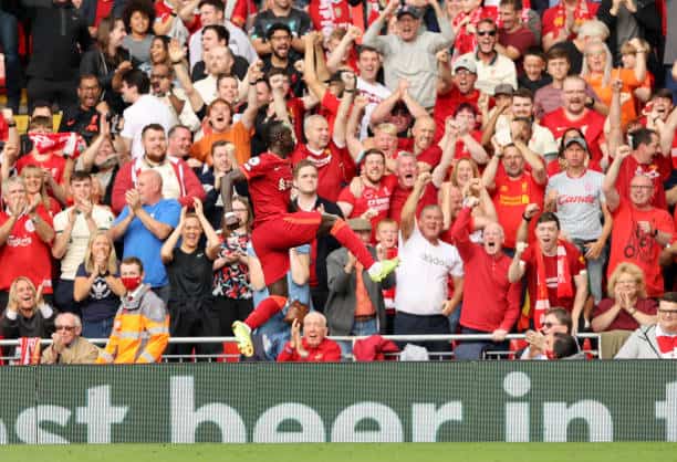 LIVERPOOL, ENGLAND - SEPTEMBER 18: Sadio Mane of Liverpool celebrates after scoring their side's first goal during the Premier League match between Liverpool and Crystal Palace at Anfield on September 18, 2021 in Liverpool, England. (Photo by Clive Brunskill/Getty Images)