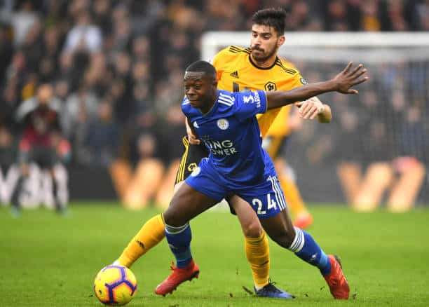 WOLVERHAMPTON, ENGLAND - JANUARY 19:  Nampalys Mendy of Leicester City holds off Ruben Neves of Wolverhampton Wanderers during the Premier League match between Wolverhampton Wanderers and Leicester City at Molineux on January 19, 2019 in Wolverhampton, United Kingdom.  (Photo by Michael Regan/Getty Images)