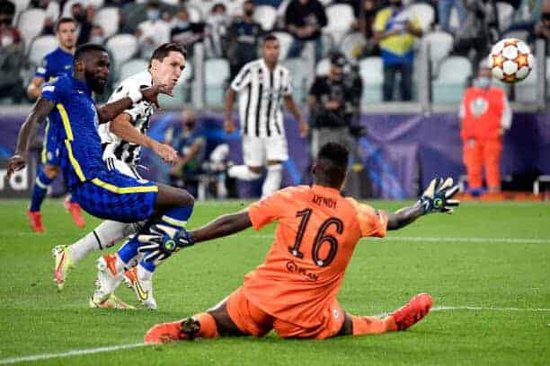 JUVENTUS STADIUM, TORINO, ITALY - 2021/09/29: Federico Chiesa of Juventus FC, challenged by Antonio Rudiger passes Edouard Mendy of Chelsea and scores the goal of 1-0 during the Uefa Champions League group H football match between Juventus FC and Chelsea. Juventus won 1-0 over Chelsea. (Photo by Andrea Staccioli/Insidefoto/LightRocket via Getty Images)