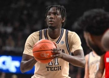 ATLANTA, GA  MARCH 01:  Georgia Tech forward Baye Ndongo (11) shoots a free throw during the college basketball game between the North Carolina State Wolfpack and the Georgia Tech Yellow Jackets on March1st, 2025 at Hank McCamish Pavilion in Atlanta, GA.  (Photo by Rich von Biberstein/Icon Sportswire via Getty Images)