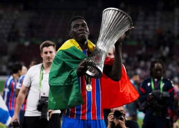 RED BULL ARENA, LEIPZIG, GERMANY - 2026/05/27: Ismaila Sarr of Crystal Palace FC poses with the trophy during the award ceremony following the UEFA Conference League 2025/26 final football match between Crystal Palace FC and Rayo Vallecano de Madrid. Crystal Palace FC won 1-0 over Rayo Vallecano de Madrid. (Photo by Nicolò Campo/LightRocket via Getty Images)