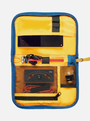 A vibrant yellow and blue organizer with various tools and instruments, including a meter, cords, and a solar panel, neatly arranged inside.