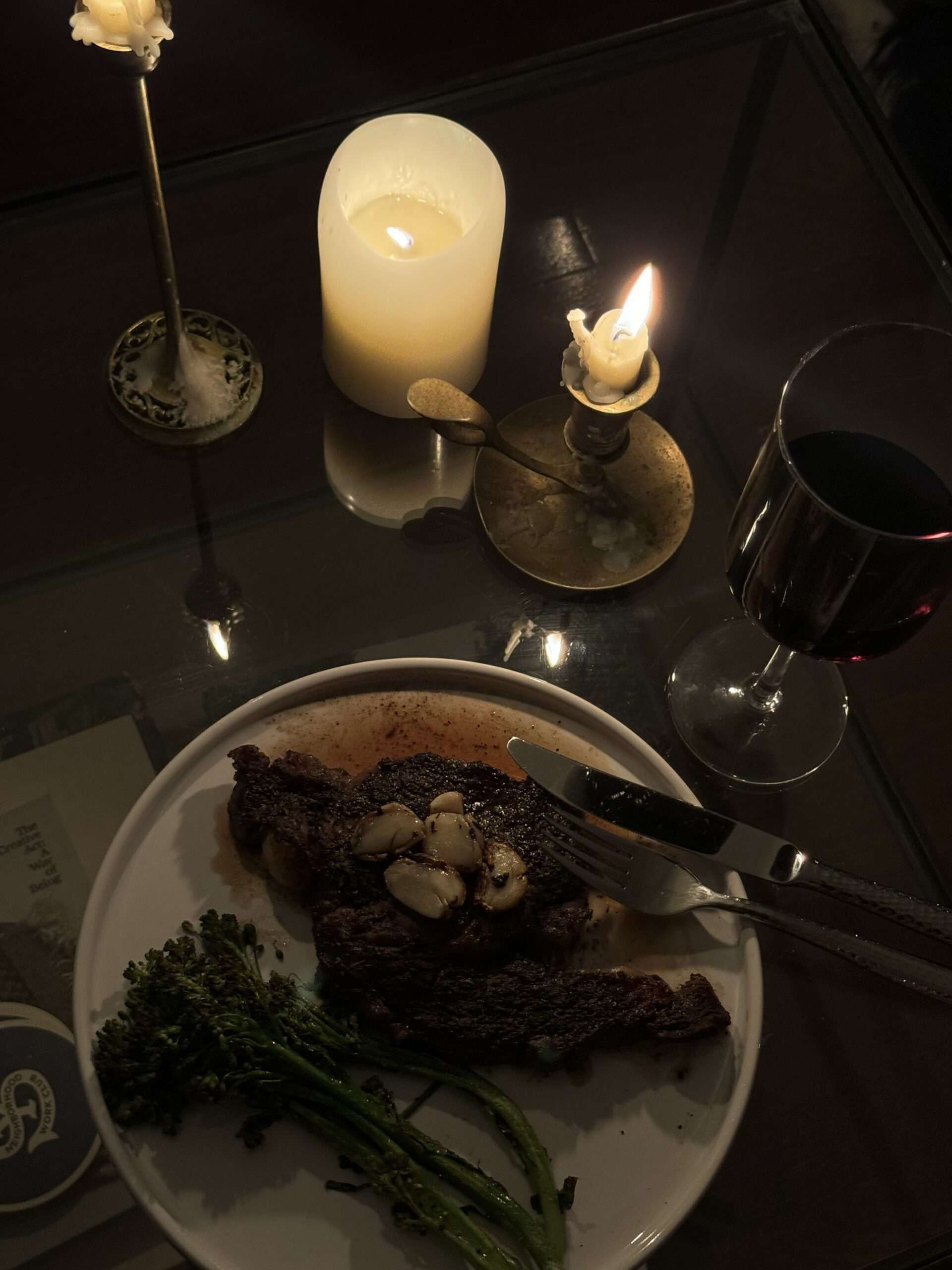 Thanksgiving dinner and candles on a table.