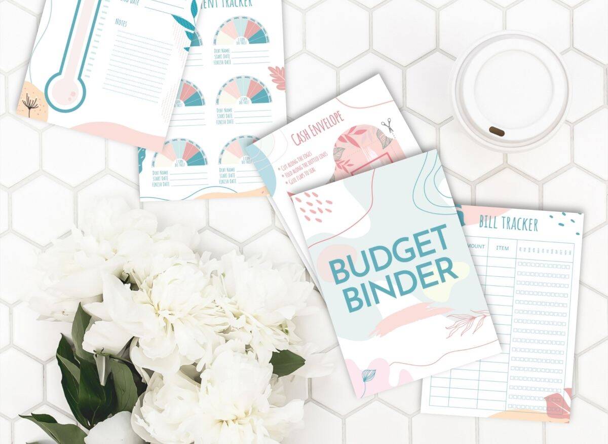 Budget planner on a marble surface.