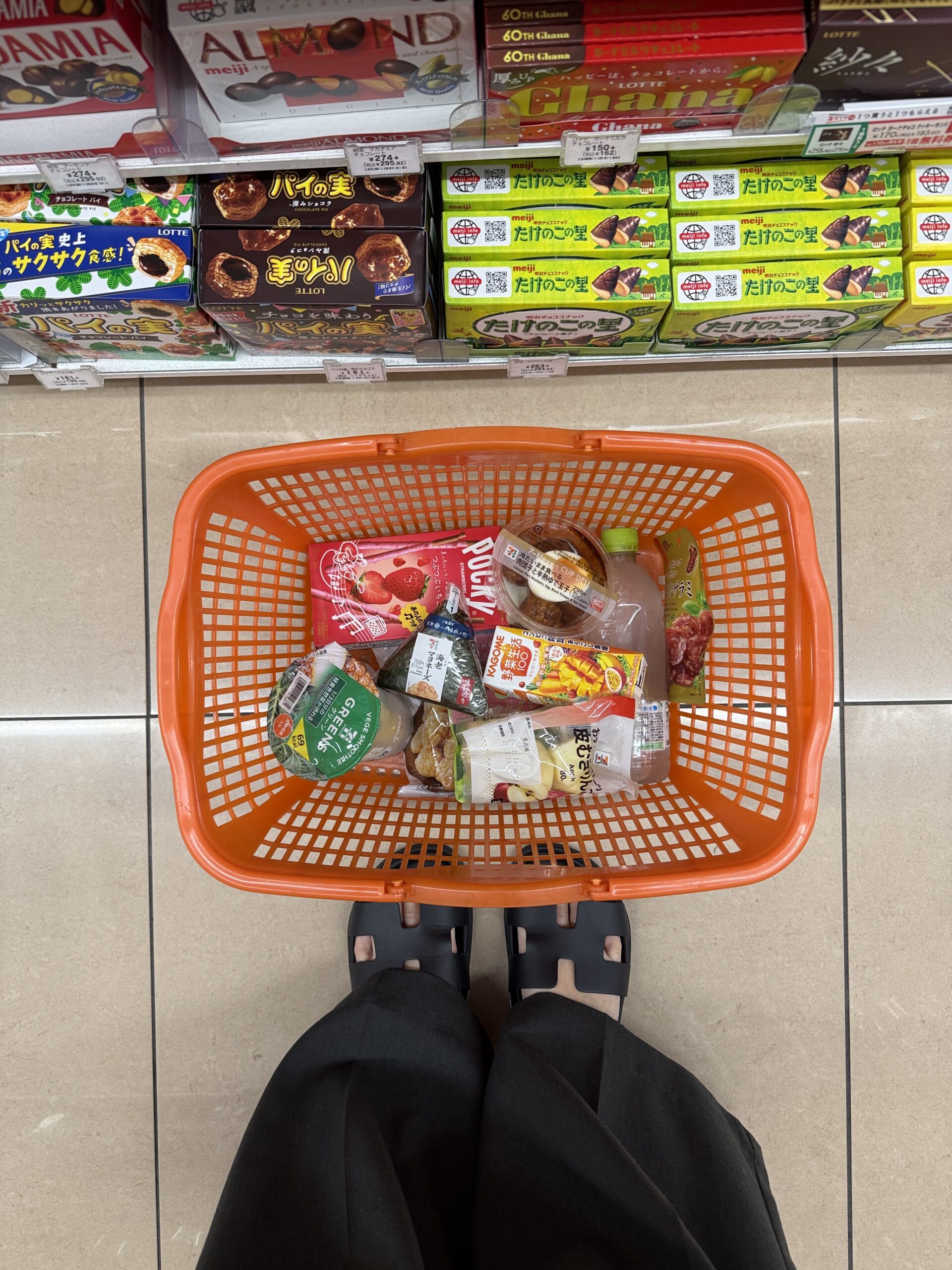 A woman with a grocery basket.