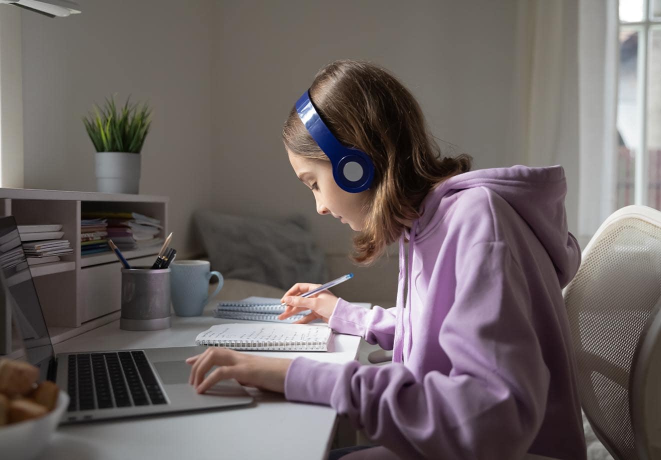 a young student studies from home using brightspace which does not sell her data