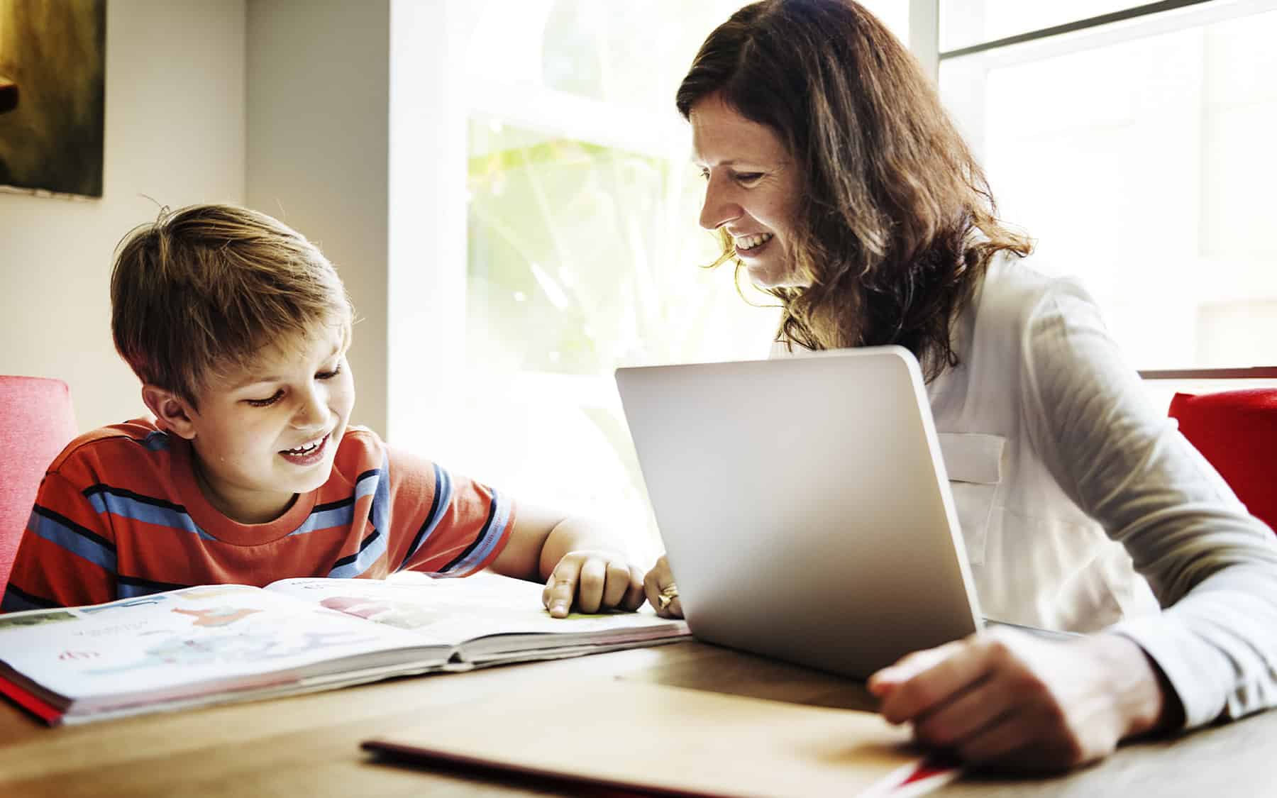 parent helping child with school work