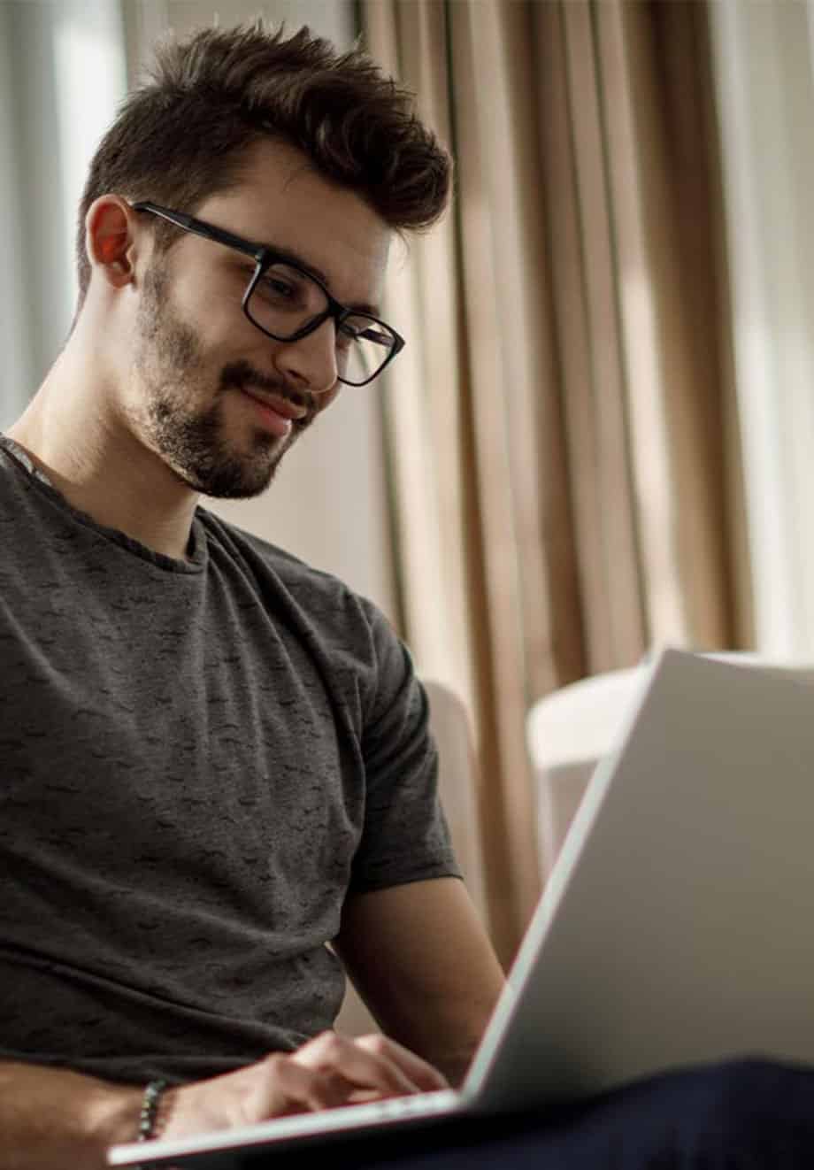 a man learning on a laptop