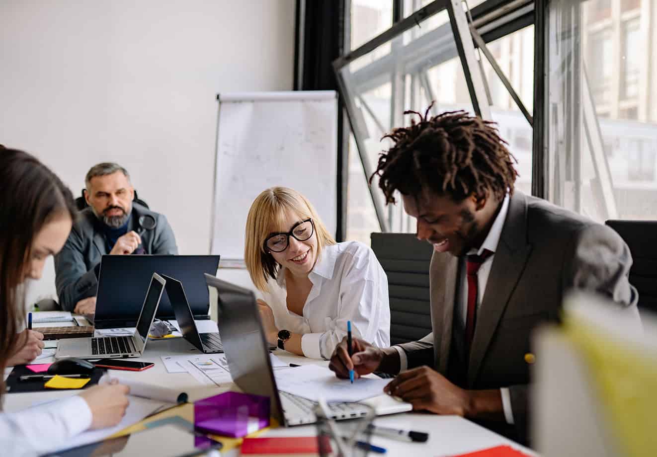 group of employees together in conference room