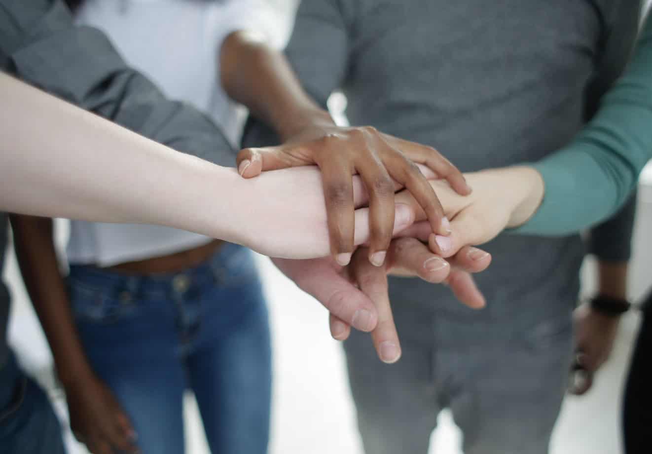 Hands together in the center