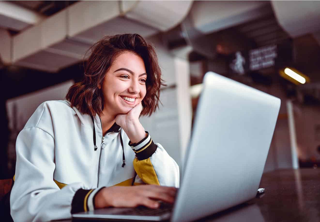 A person using a laptop.