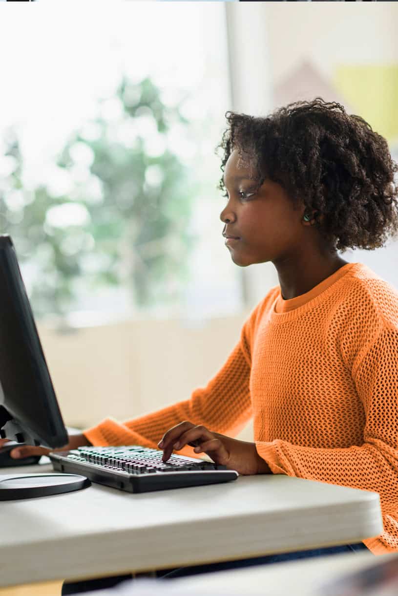 Student working on computer at school