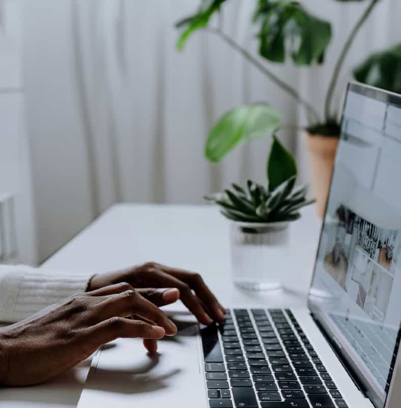 Fingers typing on keyboard