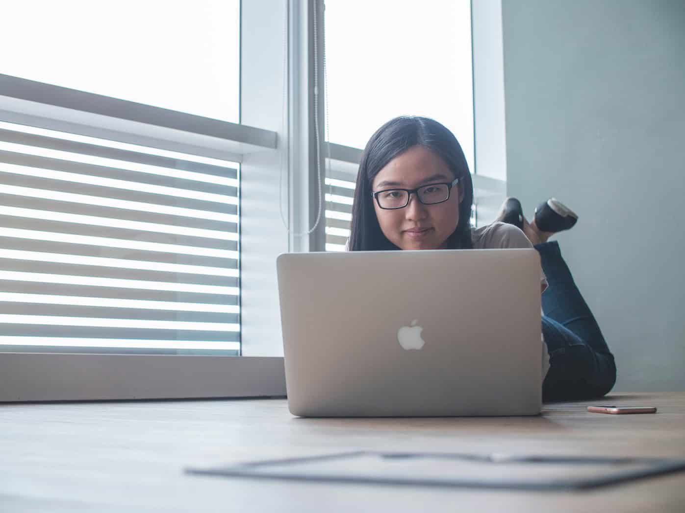 student studying at laptop