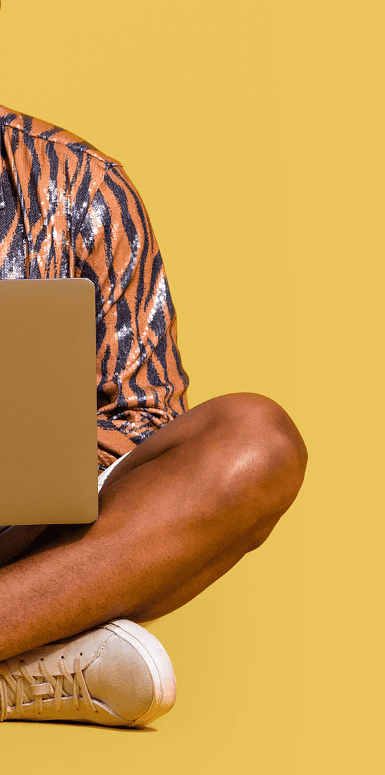 person sitting with laptop