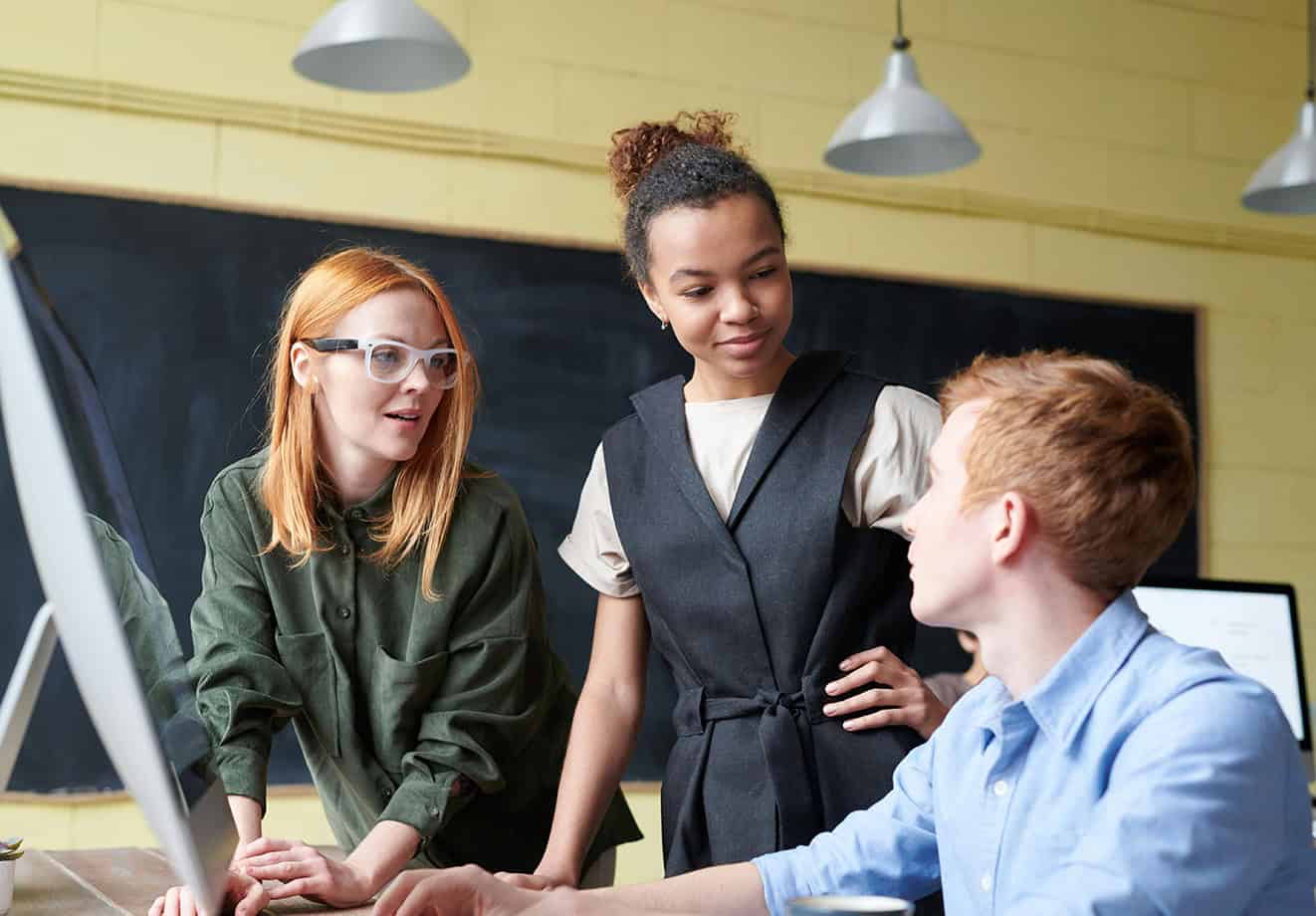 Co-op students working together at a desk