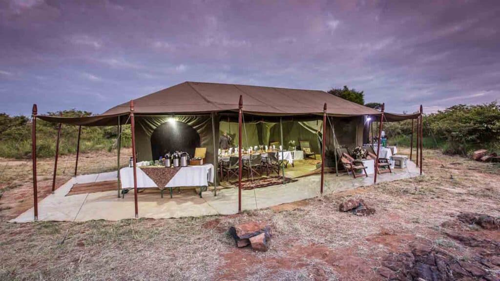 Dining area underneath tent | Photo credit - Siruai Mobile Camp