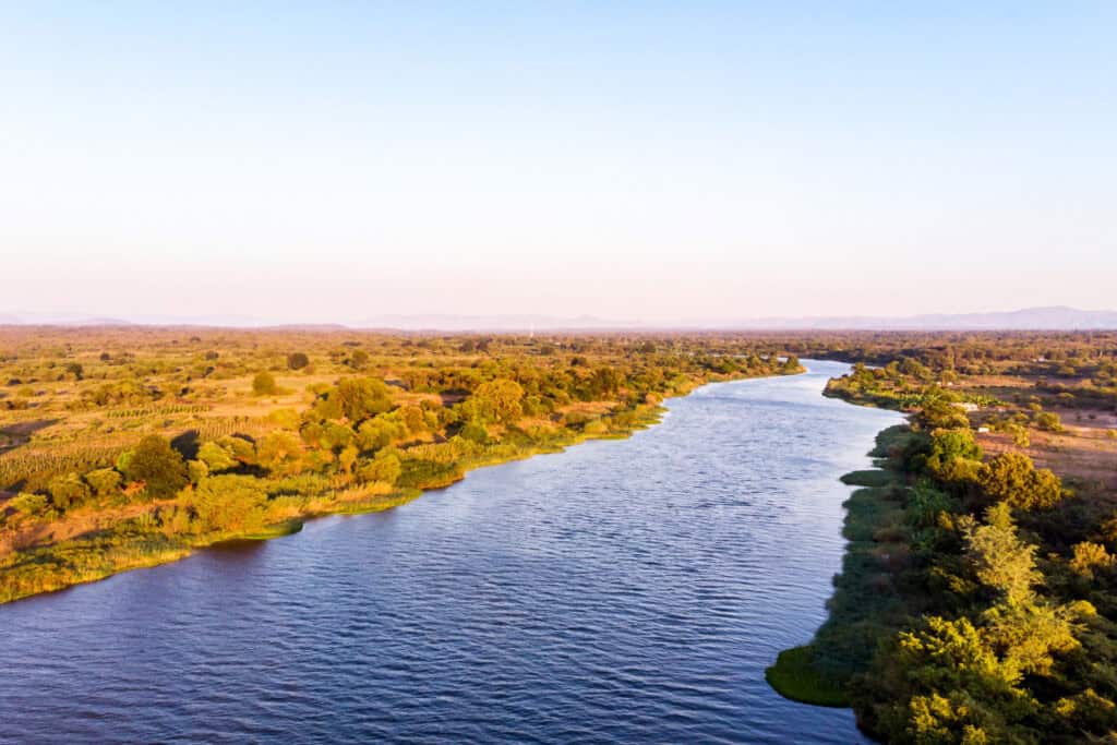 Aerial view of Lower Zambezi River, Zambia | Photo credit: GCShutter, Getty Images via Canva