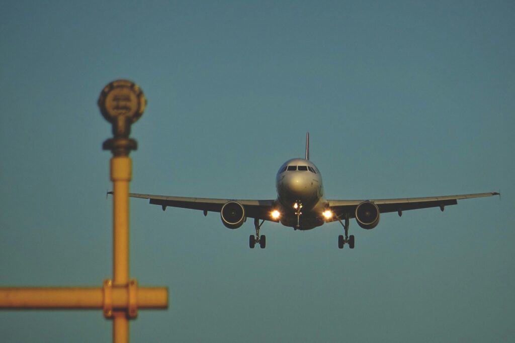 An aeroplane lands in Paris, France.