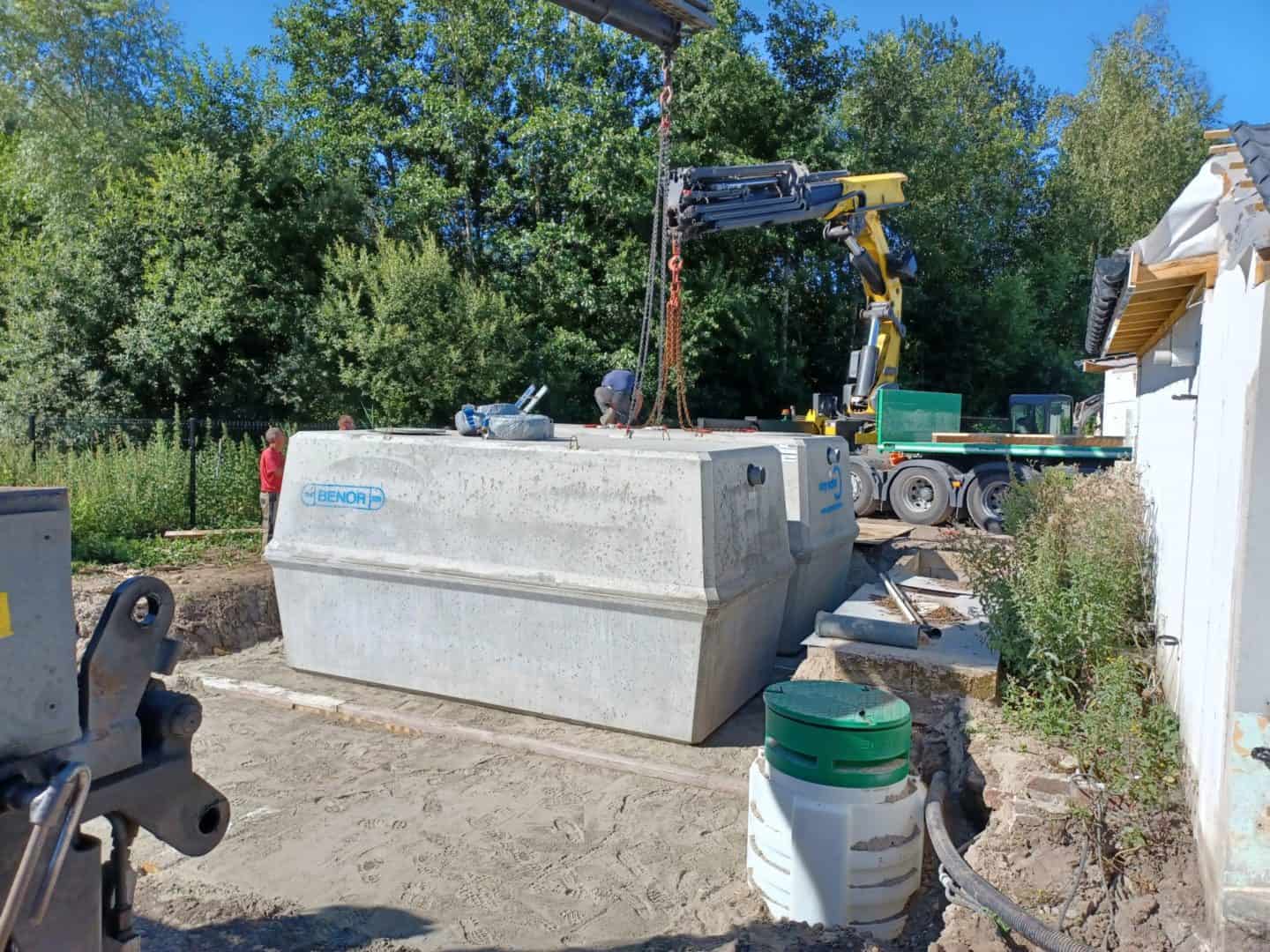 pose d'un récupérateur d'eau de pluie de 150 équivalent habitant