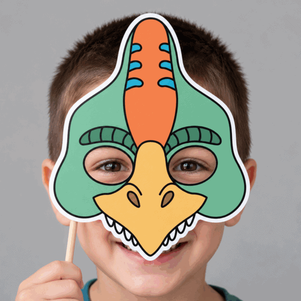 Dinosaur paper mask pre-colored printable craft - child wearing the finished mask