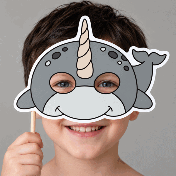 Narwhal paper mask pre-colored printable craft - child wearing the finished mask