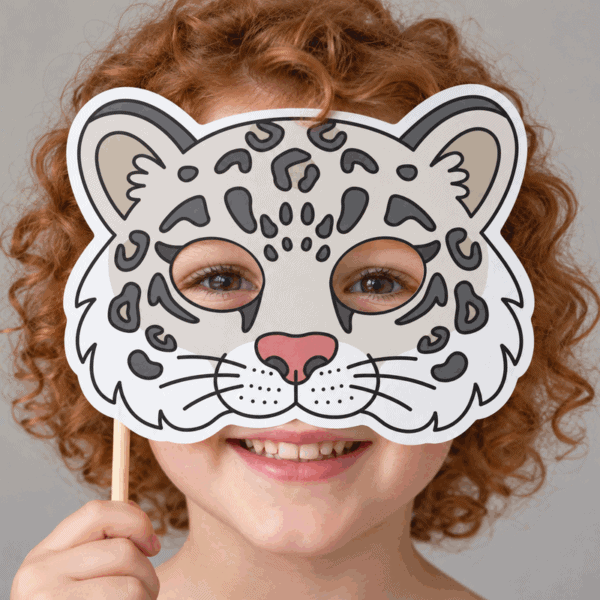 SnowLeopard paper mask pre-colored printable craft - child wearing the finished mask
