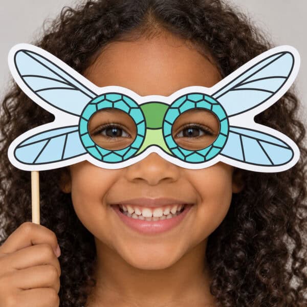 Dragonfly paper mask colored - child wearing finished mask
