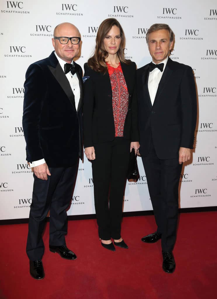 IWC Schaffhausen CEO Georges Kern, Hilary Swank and Christoph Waltz attend the IWC “Come Fly with Us” Gala Dinner.