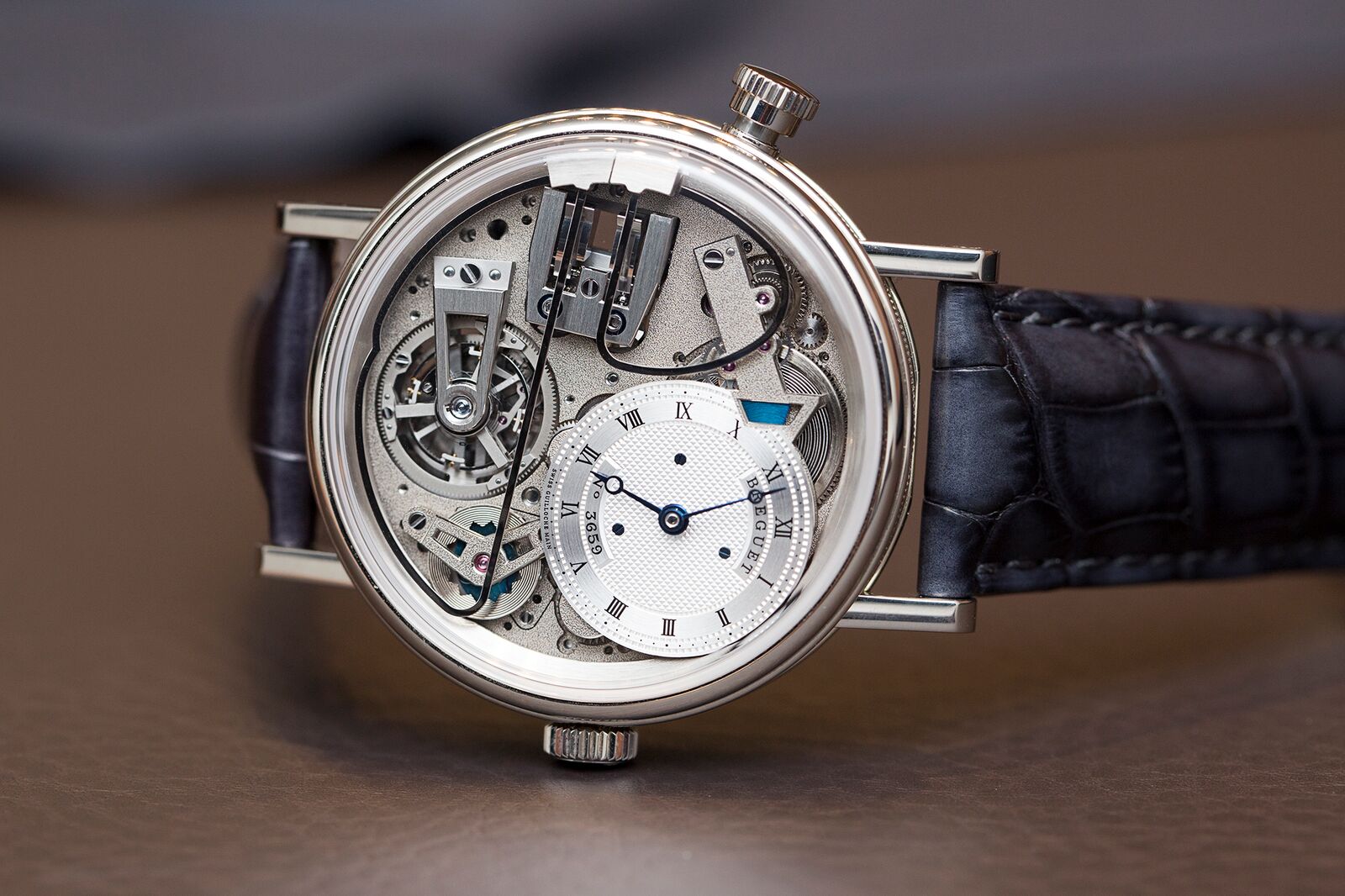 To create a better performing governor Breguet developed one that utilizes magnetism and put it in this stunning Tradition 7078 Minute Repeater Tourbillon. The wire gongs are the two metal wires that start at the three o'clock position and curve around on the front of the watch.