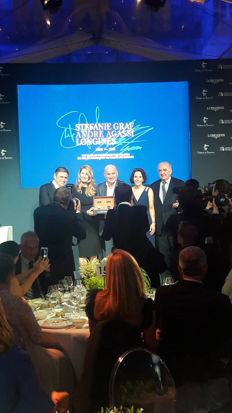 Longines President Walter von Känel and Vice-President Juan Carlos Capelli join the stage to support the charities of Andre Agessi and Stefanie Graf with an exclusive limited edition