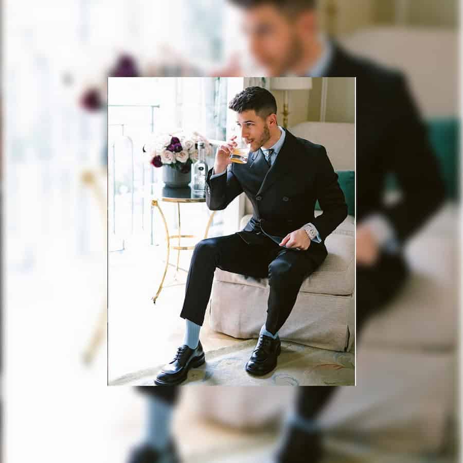 Nick Jonas wearing the one million dollar Bulgari Octo L'Originale