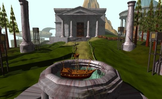A screenshot of the video game Myst. A wooden ship floats in a small pool outside a large building with greek-style columns. A mountain can be seen in the background.