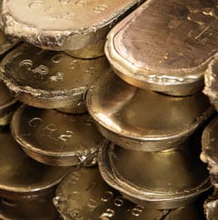 Close up photo of stacked babbitt ingots.
