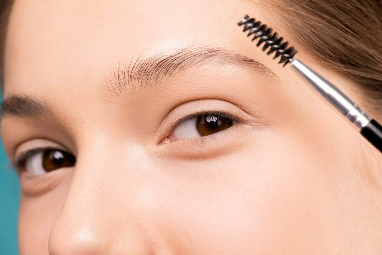 what causes eyebrow loss