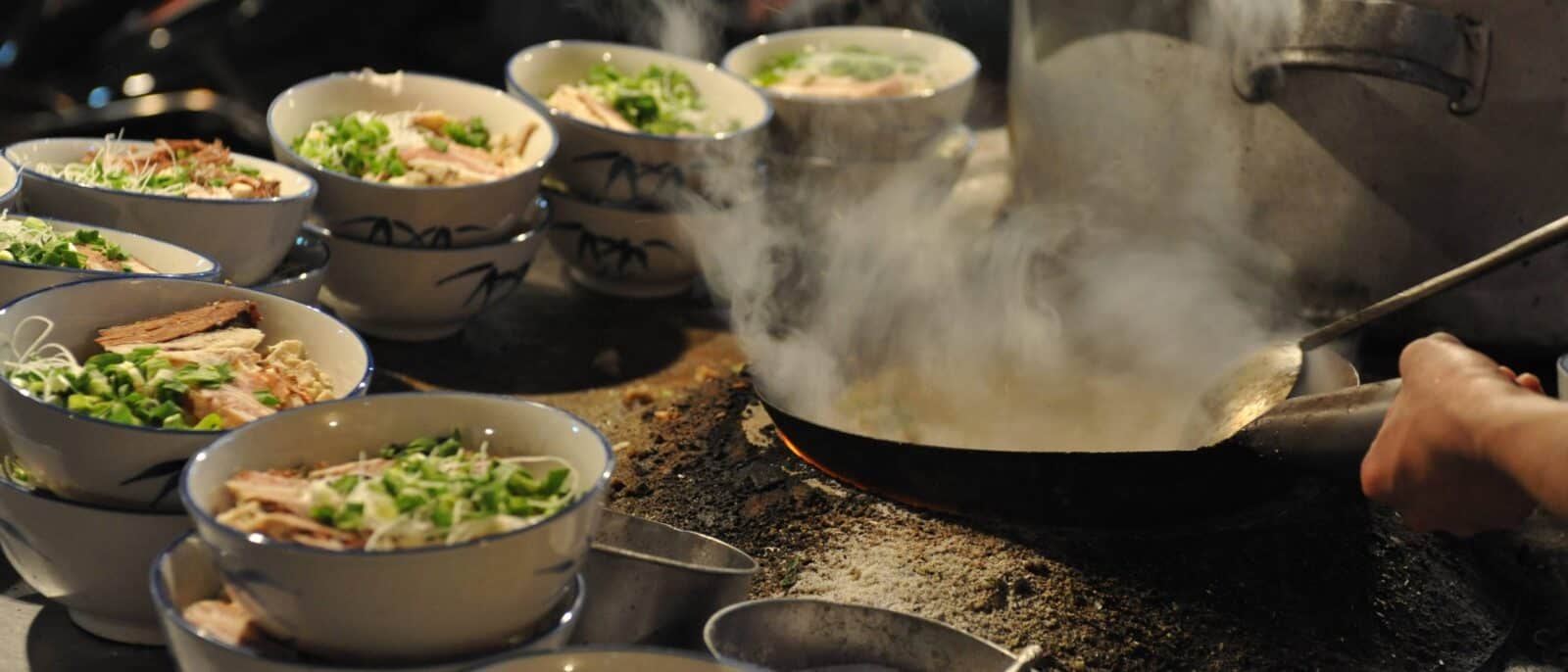 View from Xi'an’s ancient city wall over the city with cyclists and pedestrians on the ramparts