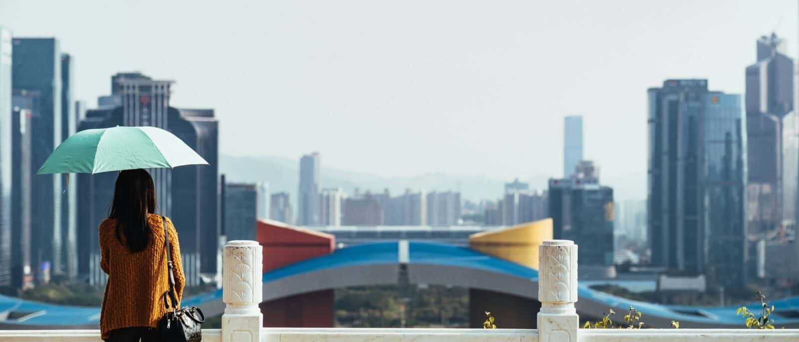 Children testing interactive screens and gadgets in a high-tech showroom in Shenzhen