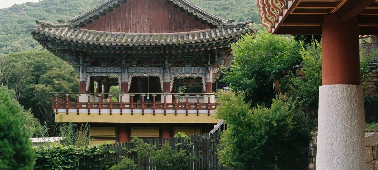 Family walking along the cobbled streets of Pingyao old town, surrounded by traditional wooden houses and red lanterns
