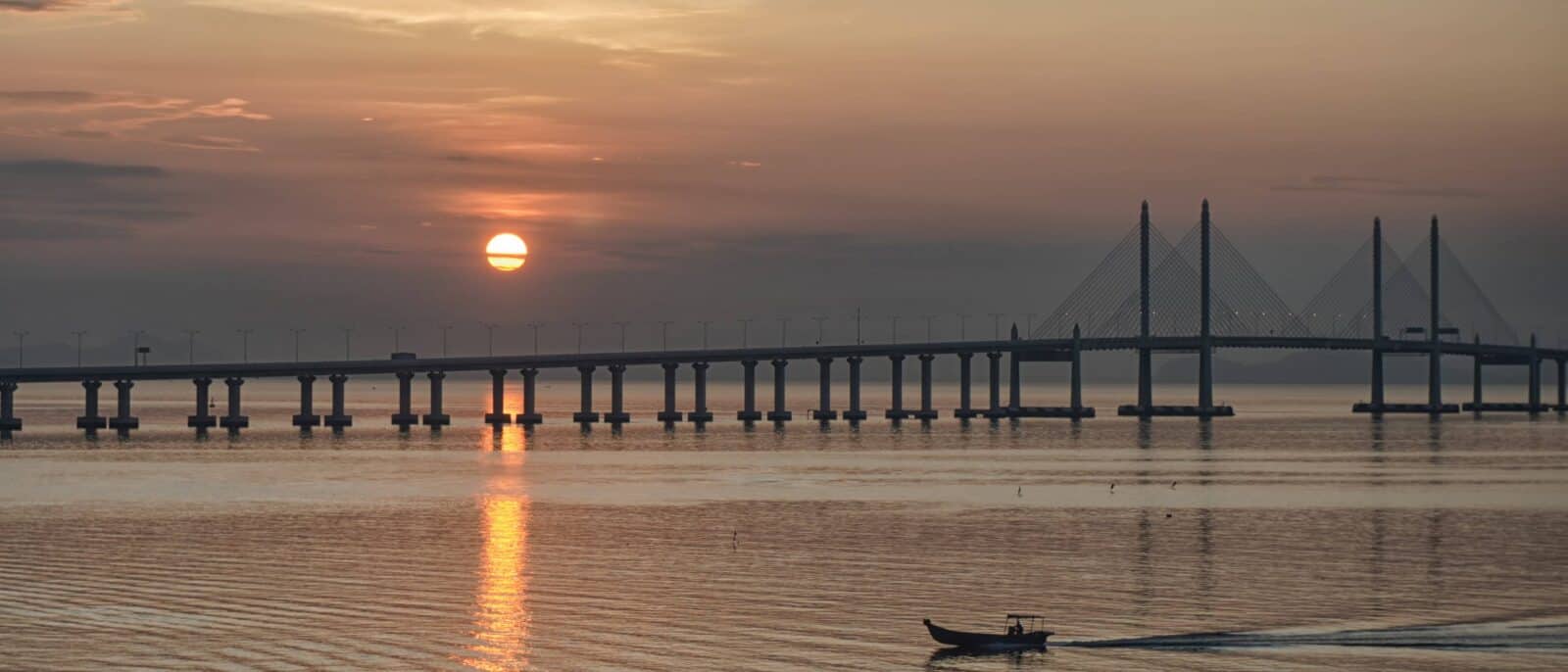 Street in George Town, Penang, lined with heritage shophouses and lanterns