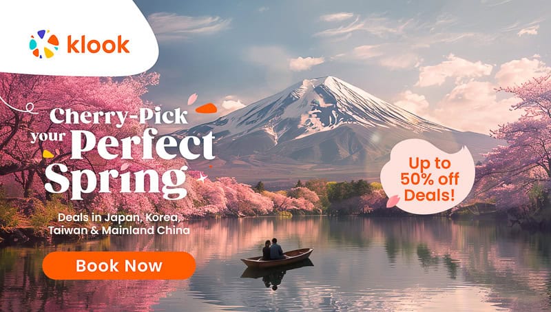 Scene of a boat on a lake with cherry blossoms on the side and snowy mountain behind, with words describing a Klook spring promotion