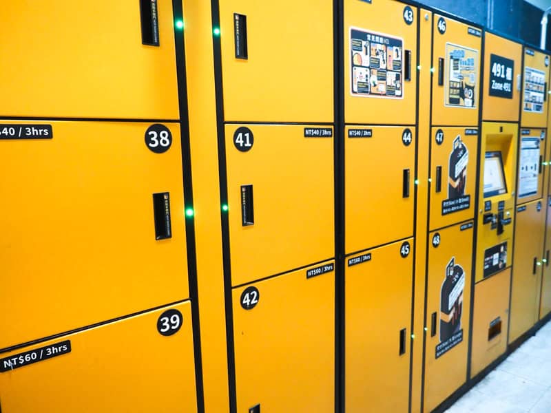 A row of orange lockers inside Sun Moon Lake bus station