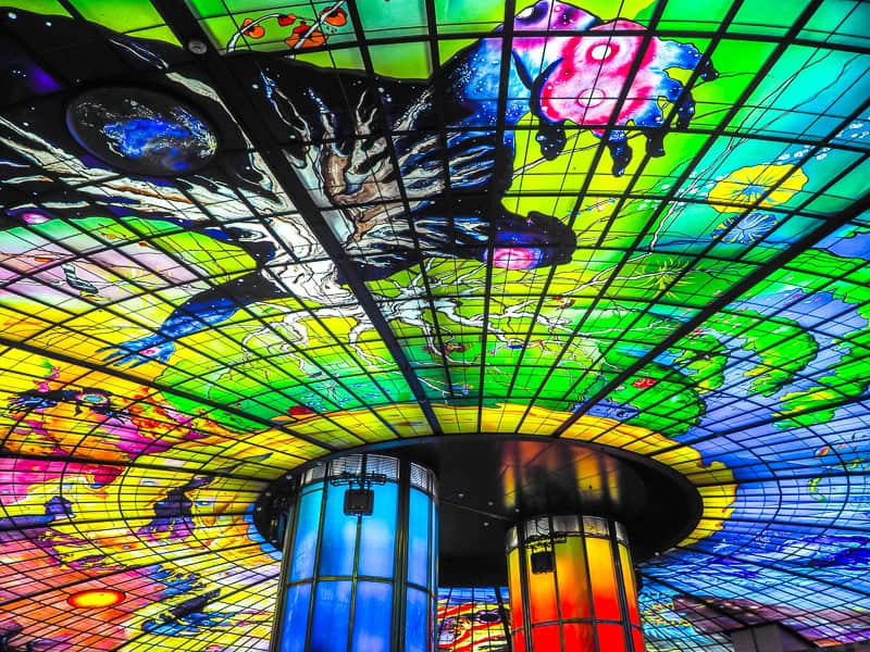 A large art installations made of colorful glass pieces inside an MRT station in Kaohsiung